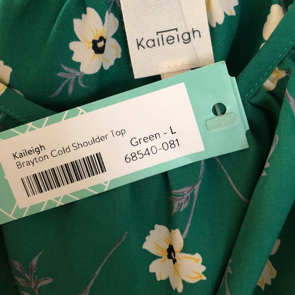 Kaileigh Brayton cold shoulder green blouse.